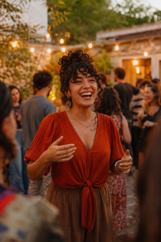 A host at an evening gathering