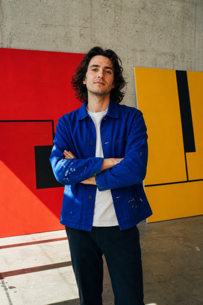 An artist in his colourful studio