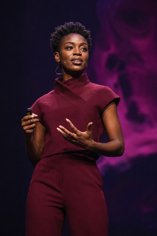 A founder presenting on stage