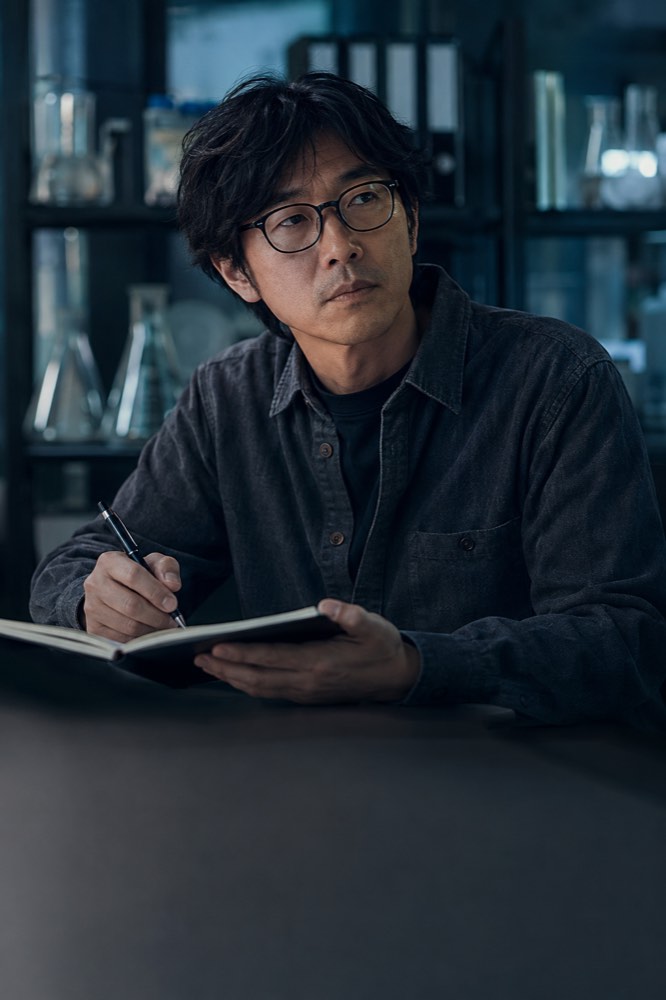 An analyst reviewing research